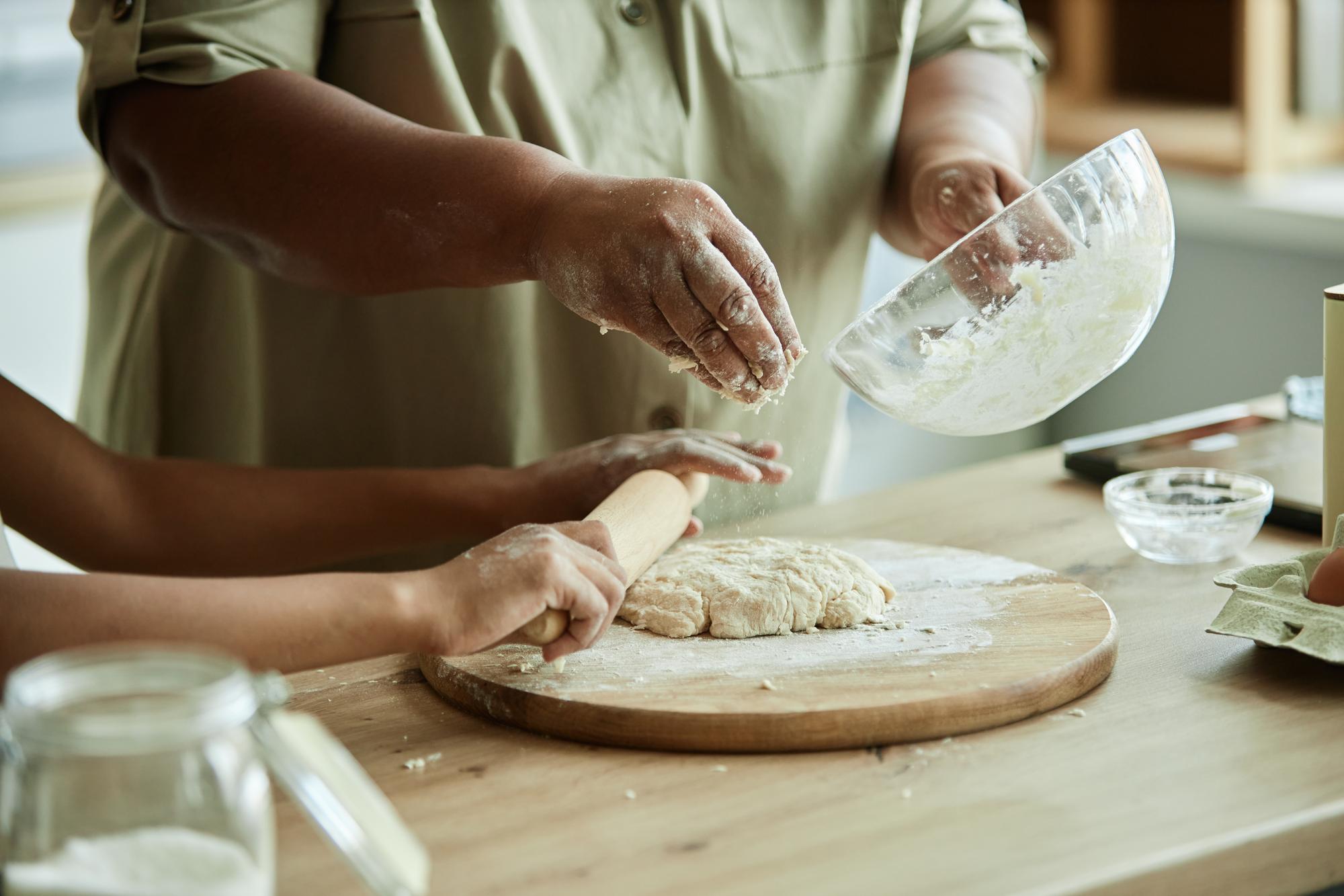 students kneading dough